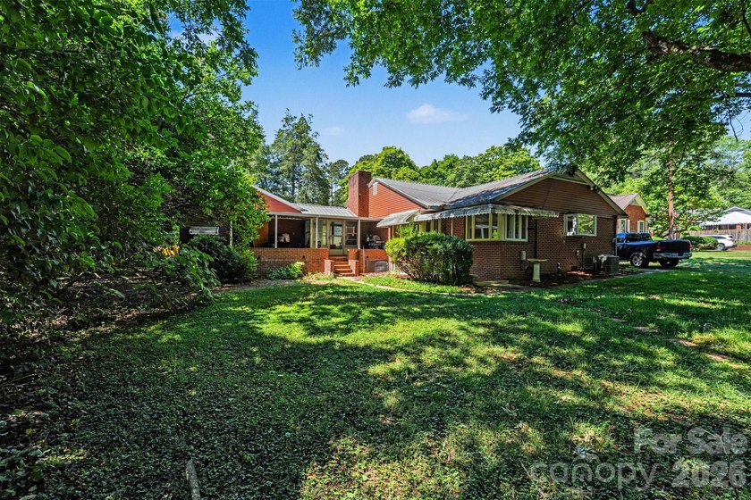 Discover the lasting value of this 3BD/3BA brick home on a rare - photo 18