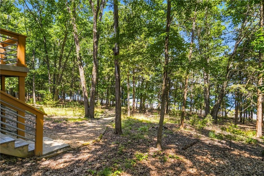 Remarkable Beaver Lake living in this custom built lake home - photo 47