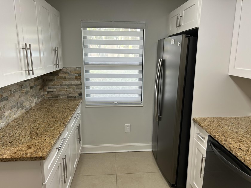 Welcome to this beautifully updated 2-bedroom, 2-bathroom - photo 8