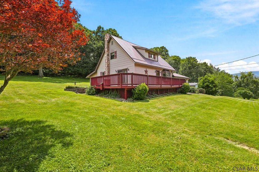 Welcome to 313 Naylor Road, a captivating 1.5-story residence - photo 3