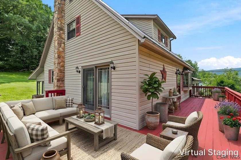 Welcome to 313 Naylor Road, a captivating 1.5-story residence - photo 6