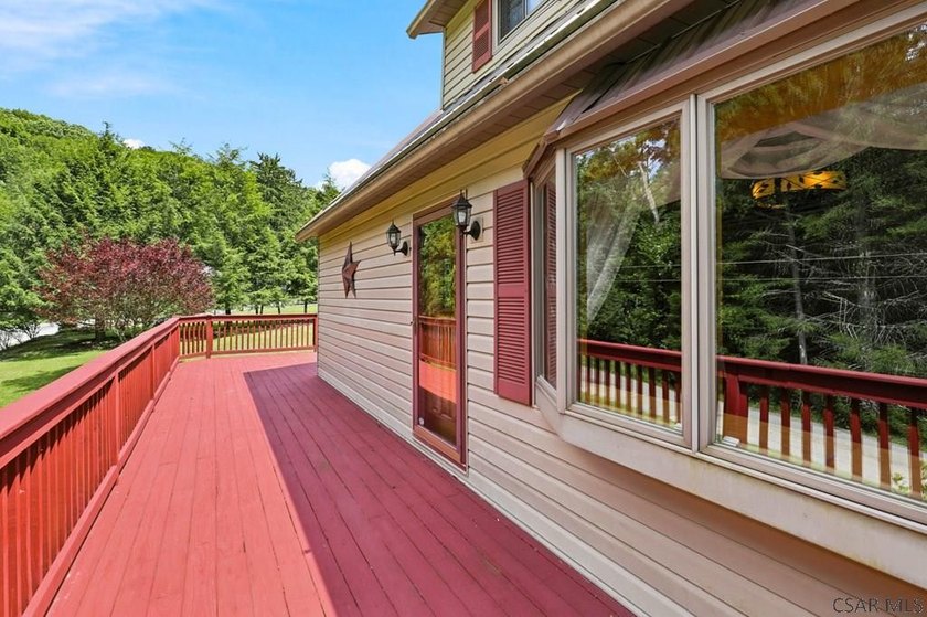 Welcome to 313 Naylor Road, a captivating 1.5-story residence - photo 8