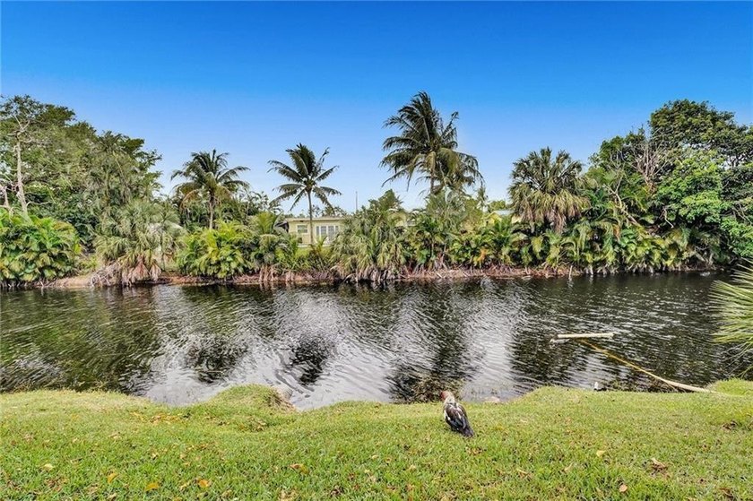 55+ TURN-KEY Tranquil Canal Views and Sunset Skies. Immaculate - photo 19