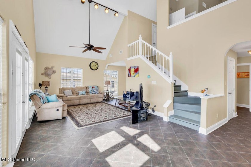Located on a spacious waterfront lot in Bay St. Louis, this - photo 6