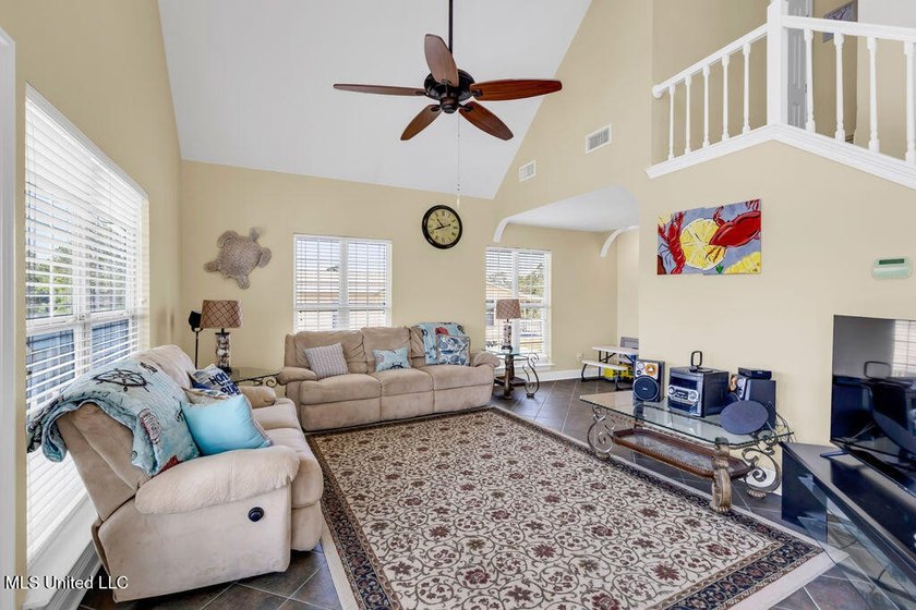 Located on a spacious waterfront lot in Bay St. Louis, this - photo 7