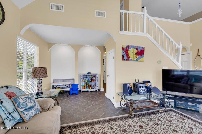 Located on a spacious waterfront lot in Bay St. Louis, this - photo 8