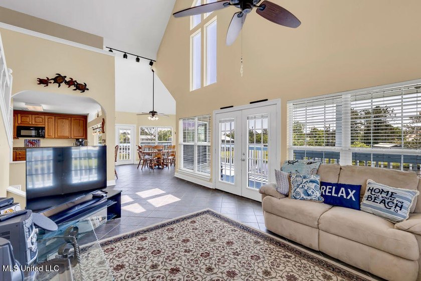 Located on a spacious waterfront lot in Bay St. Louis, this - photo 9