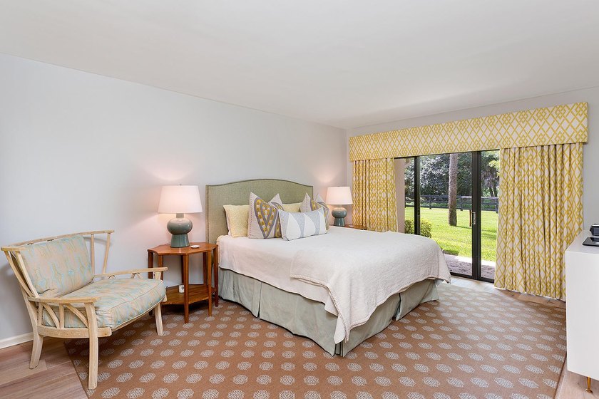 Welcome to this charming two-bedroom, two-bathroom condominium - photo 12