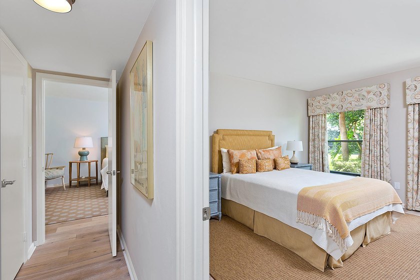 Welcome to this charming two-bedroom, two-bathroom condominium - photo 17