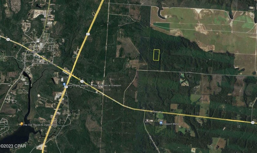 This sprawling 20.28-acre property in Freeport, FL features a - photo 2