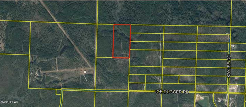 This sprawling 20.28-acre property in Freeport, FL features a - photo 3
