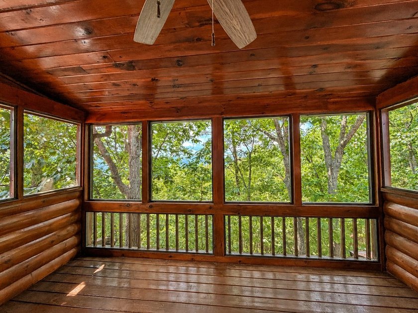 Tucked into a private wooded setting on top of the mountain in - photo 13