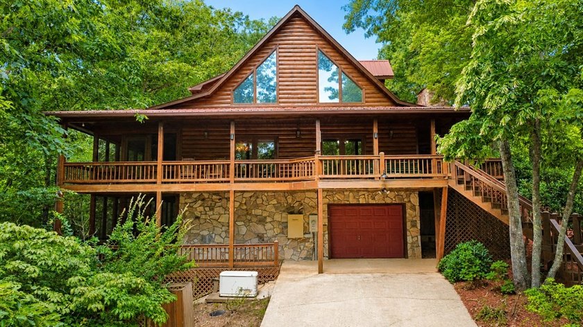 Tucked into a private wooded setting on top of the mountain in - photo 30