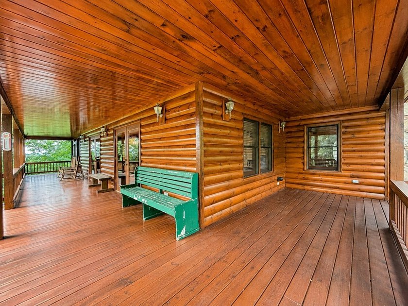 Tucked into a private wooded setting on top of the mountain in - photo 35