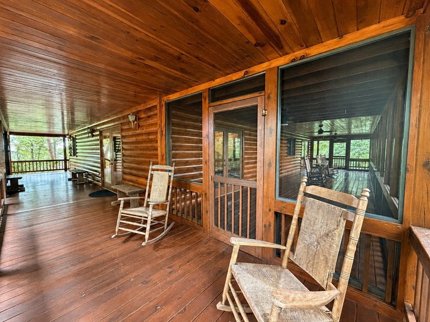 Tucked into a private wooded setting on top of the mountain in - photo 36