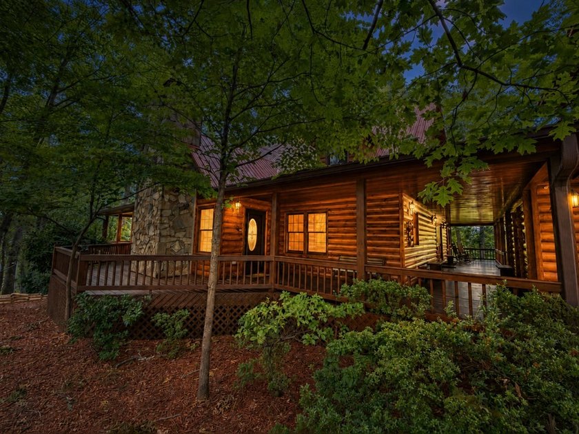 Tucked into a private wooded setting on top of the mountain in - photo 37