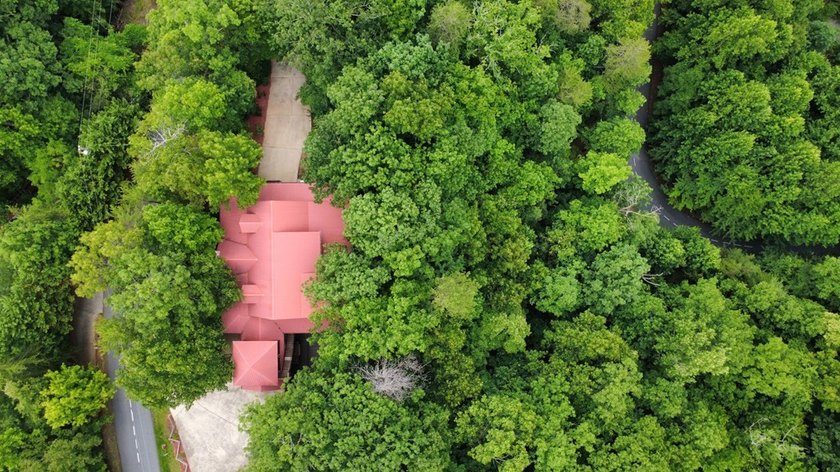 Tucked into a private wooded setting on top of the mountain in - photo 38