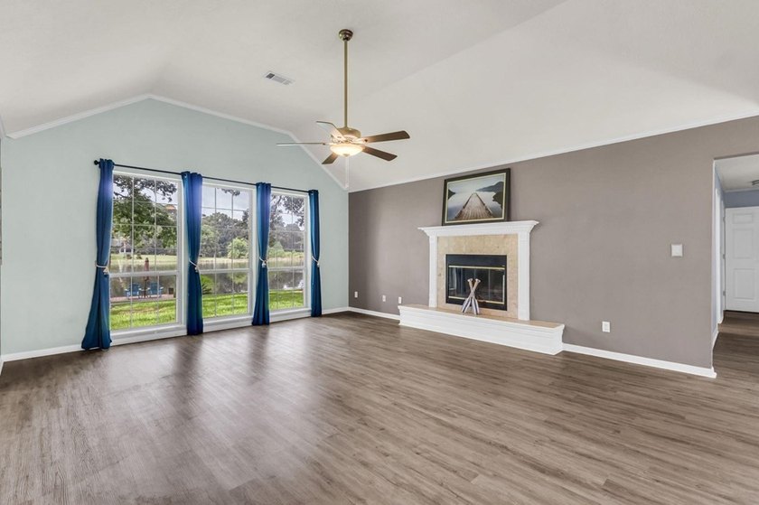 Experience luxury lakeside living in this custom built brick - photo 12