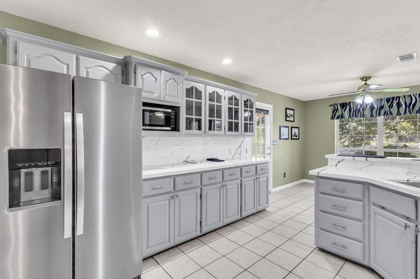 Experience luxury lakeside living in this custom built brick - photo 20