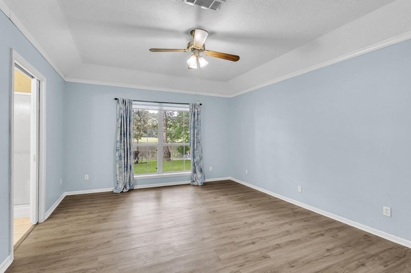 Experience luxury lakeside living in this custom built brick - photo 21
