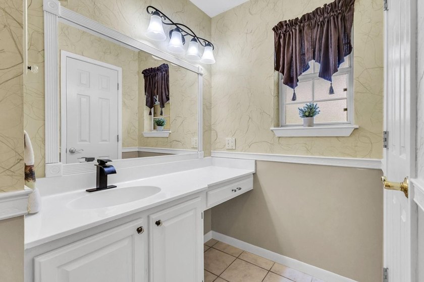 Experience luxury lakeside living in this custom built brick - photo 23