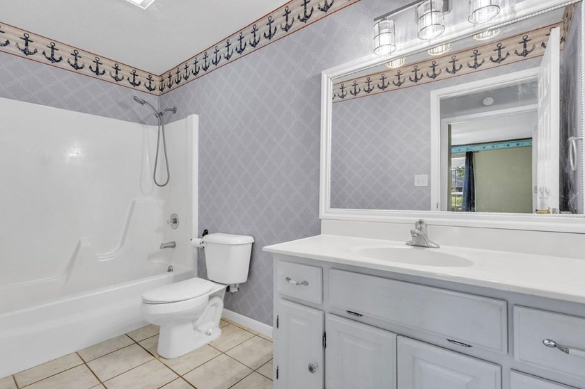 Experience luxury lakeside living in this custom built brick - photo 26