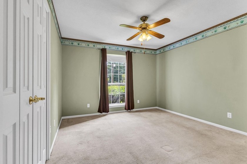 Experience luxury lakeside living in this custom built brick - photo 27