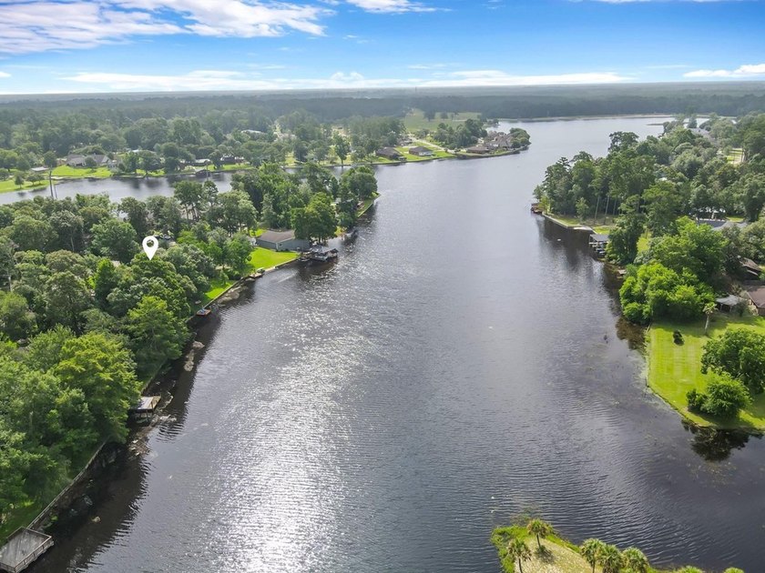 Experience luxury lakeside living in this custom built brick - photo 36