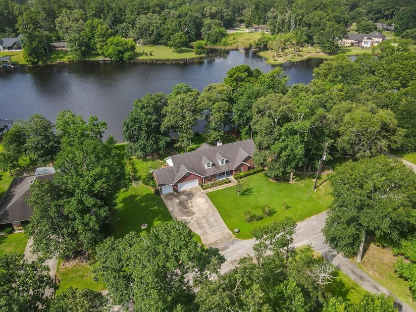 Experience luxury lakeside living in this custom built brick - photo 49