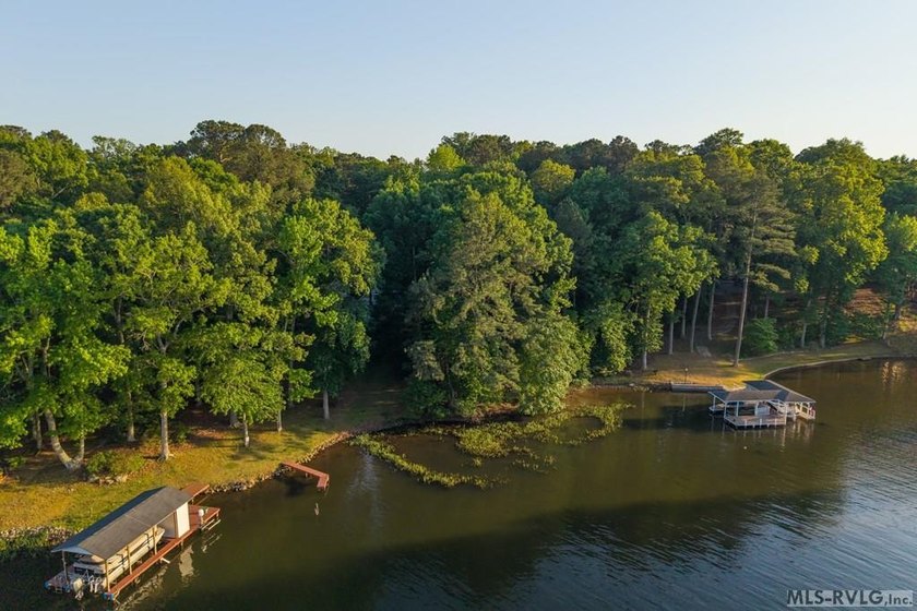 Moderately wooded waterfront lot with plenty of natural light - photo 2