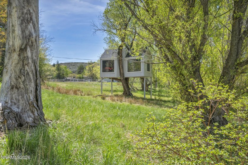 Behind a private tree lined drive in Holcomb Ranch lies a rare - photo 33