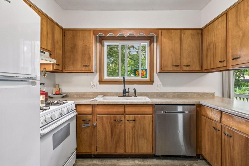 Welcome home to this charming 3-bedroom, 2-bath rambler nestled - photo 16