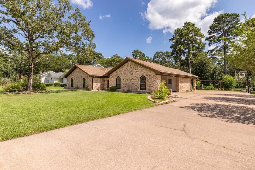 Nestled on a picturesque golf course lot, this exceptional - photo 30