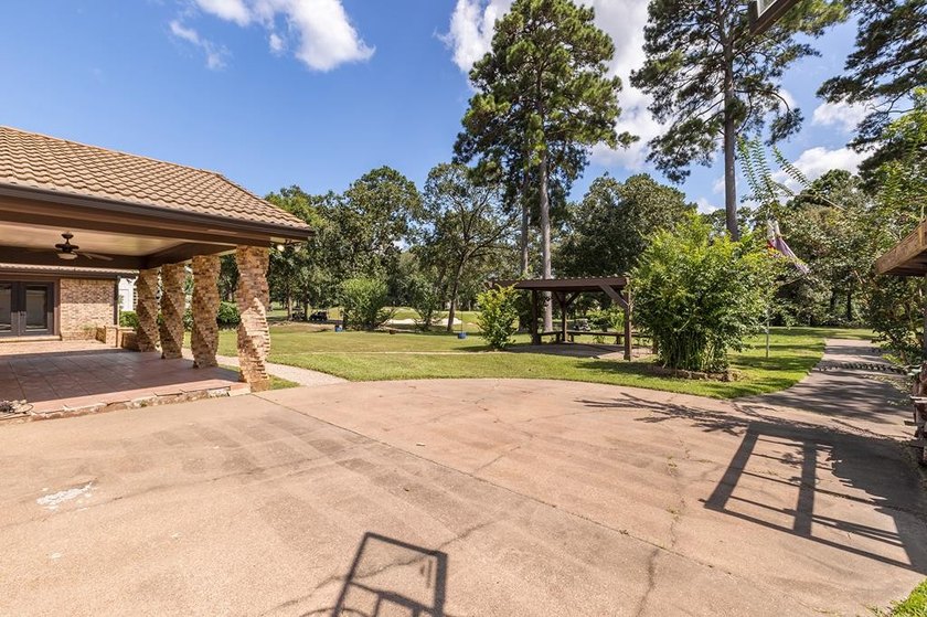 Nestled on a picturesque golf course lot, this exceptional - photo 31