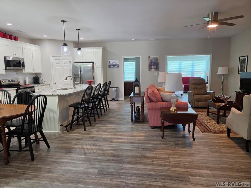 This beautiful 3-bedroom, 3-bathroom brick patio home is only - photo 4