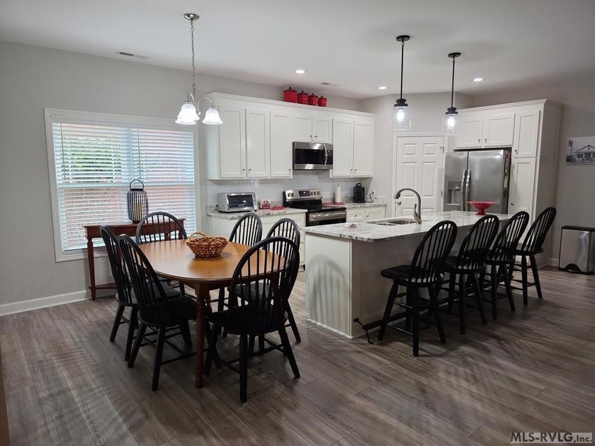 This beautiful 3-bedroom, 3-bathroom brick patio home is only - photo 9
