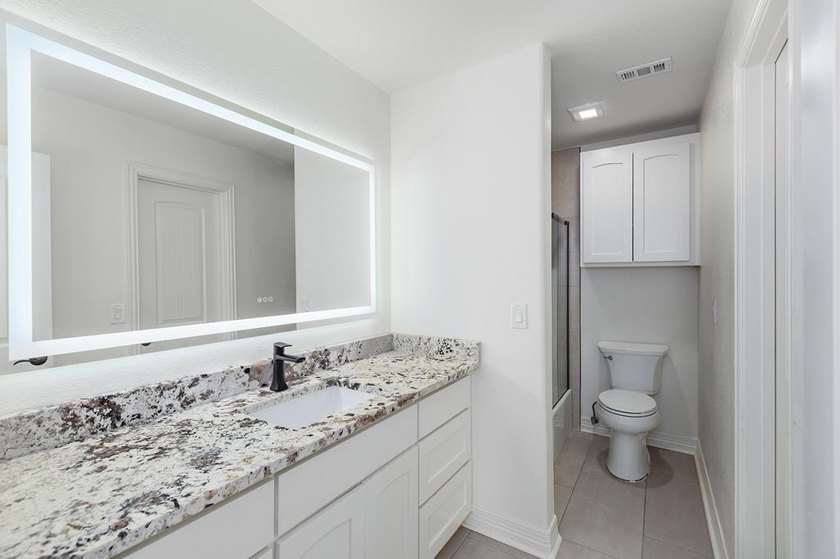 Nestled on a picturesque golf course lot, this exceptional - photo 47