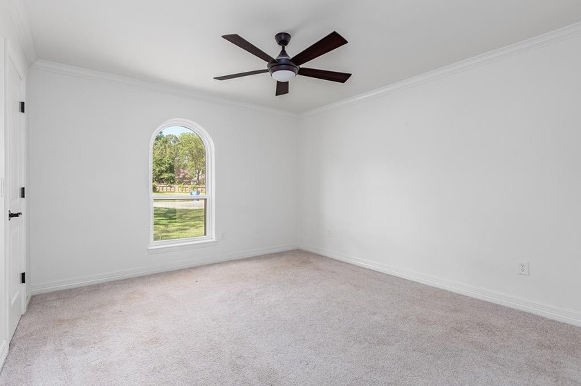 Nestled on a picturesque golf course lot, this exceptional - photo 48