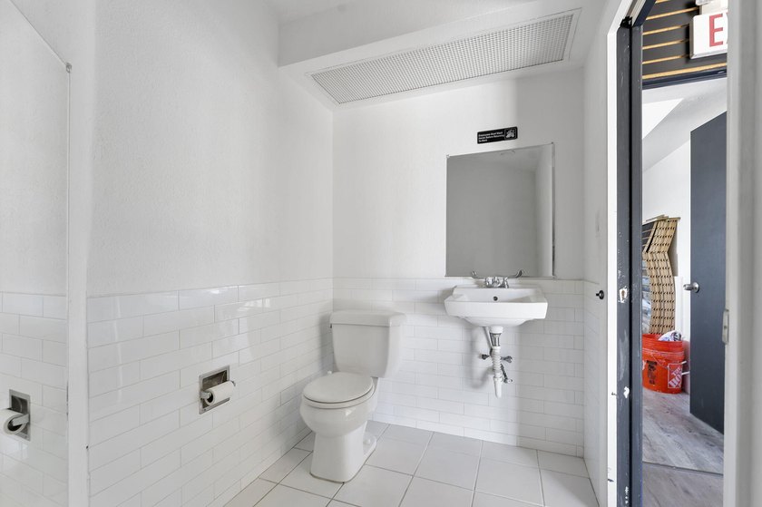 Prime location alert! This free-standing retail building with - photo 8