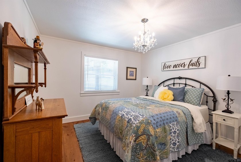 Main lake waterfront with private dock, updated interior, and - photo 16