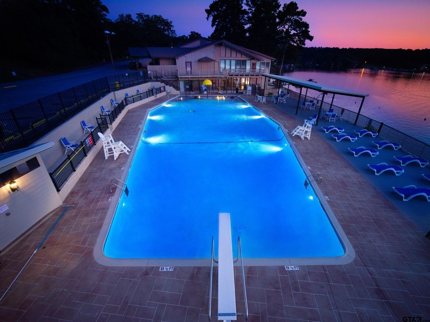 Main lake waterfront with private dock, updated interior, and - photo 29