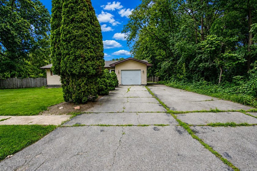 Welcome to your next home in Lake Station, Indiana where comfort - photo 3