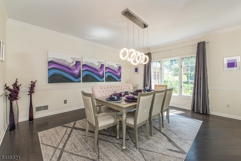 This stunning colonial is set on nearly 2 acres at the end of a - photo 3