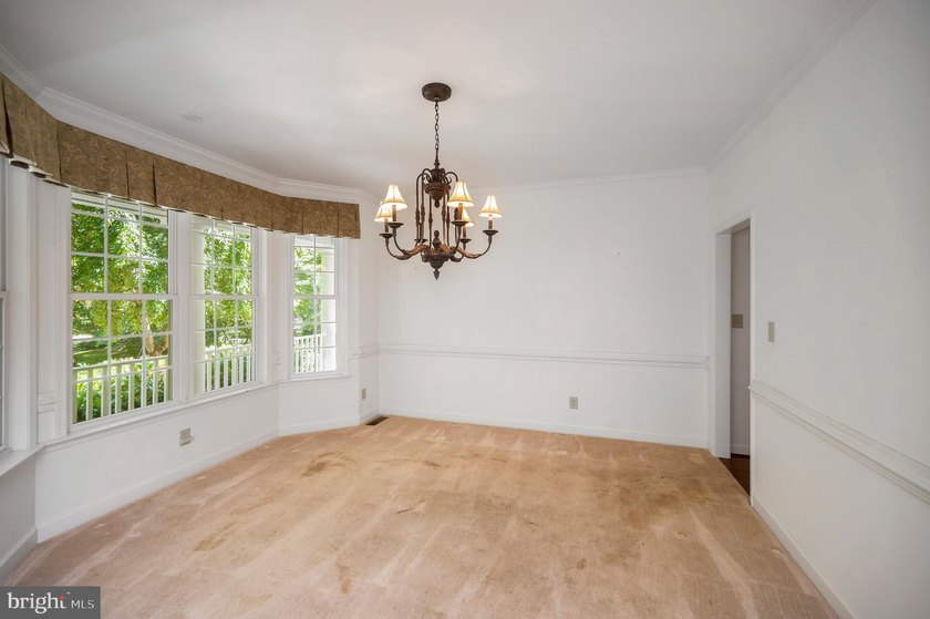 Imagine starting your day on the expansive covered front porch - photo 12