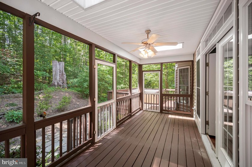 Imagine starting your day on the expansive covered front porch - photo 18