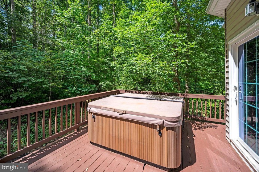 Imagine starting your day on the expansive covered front porch - photo 30