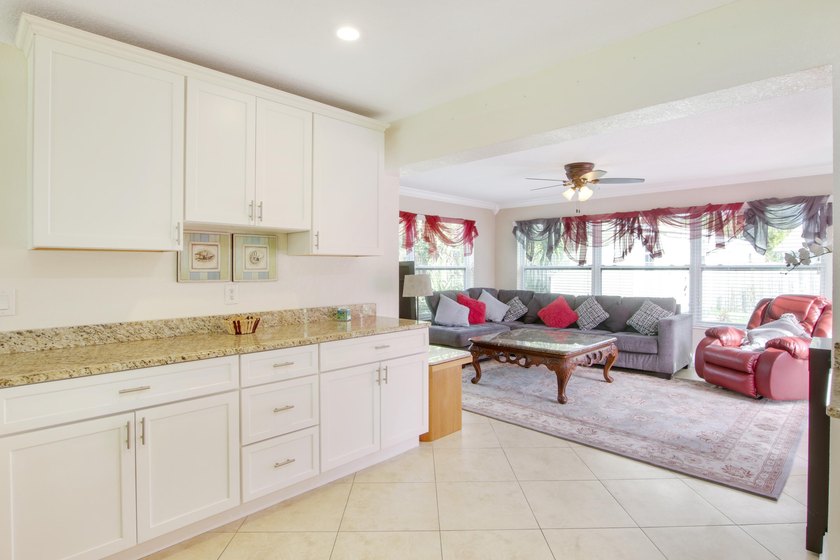 Welcome to this charming 4-bedroom, 2-bathroom home that - photo 4