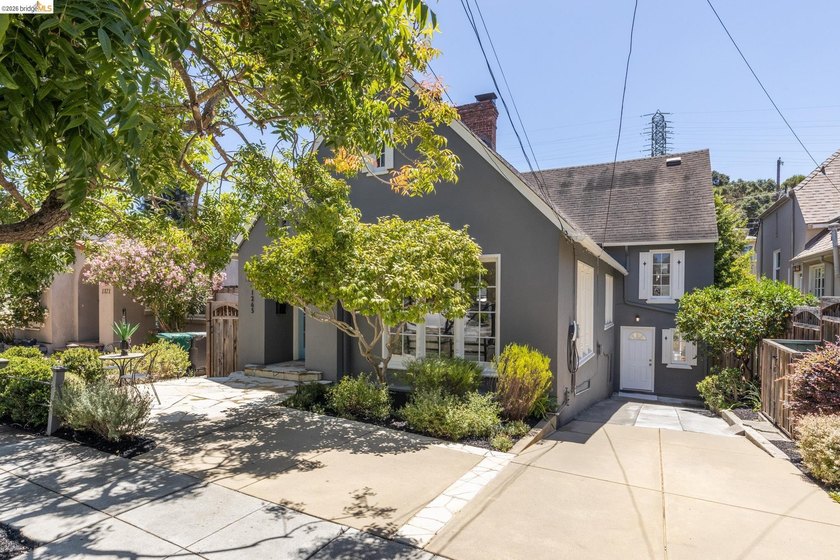This picturesque Tudor home is located on a quiet tree-lined - photo 3