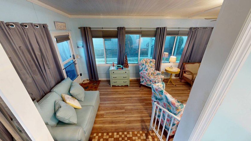 This single-story home is in Reflections On Silver Lake (55+ - photo 5