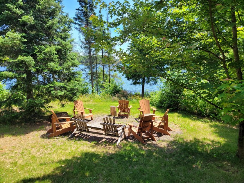 Pinestone Crossing sits on 26 shared wooded acres with over 700' - photo 18